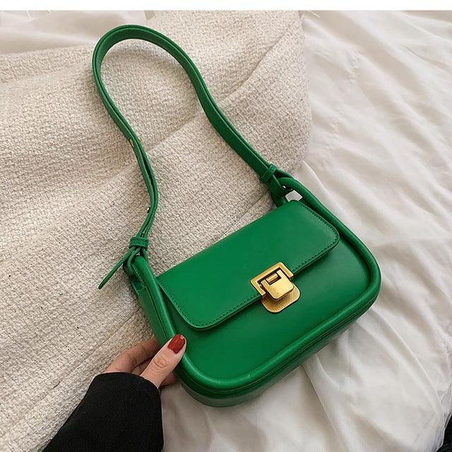 Small Faux Leather Bag With A Gold Buckle - Mad Jade's